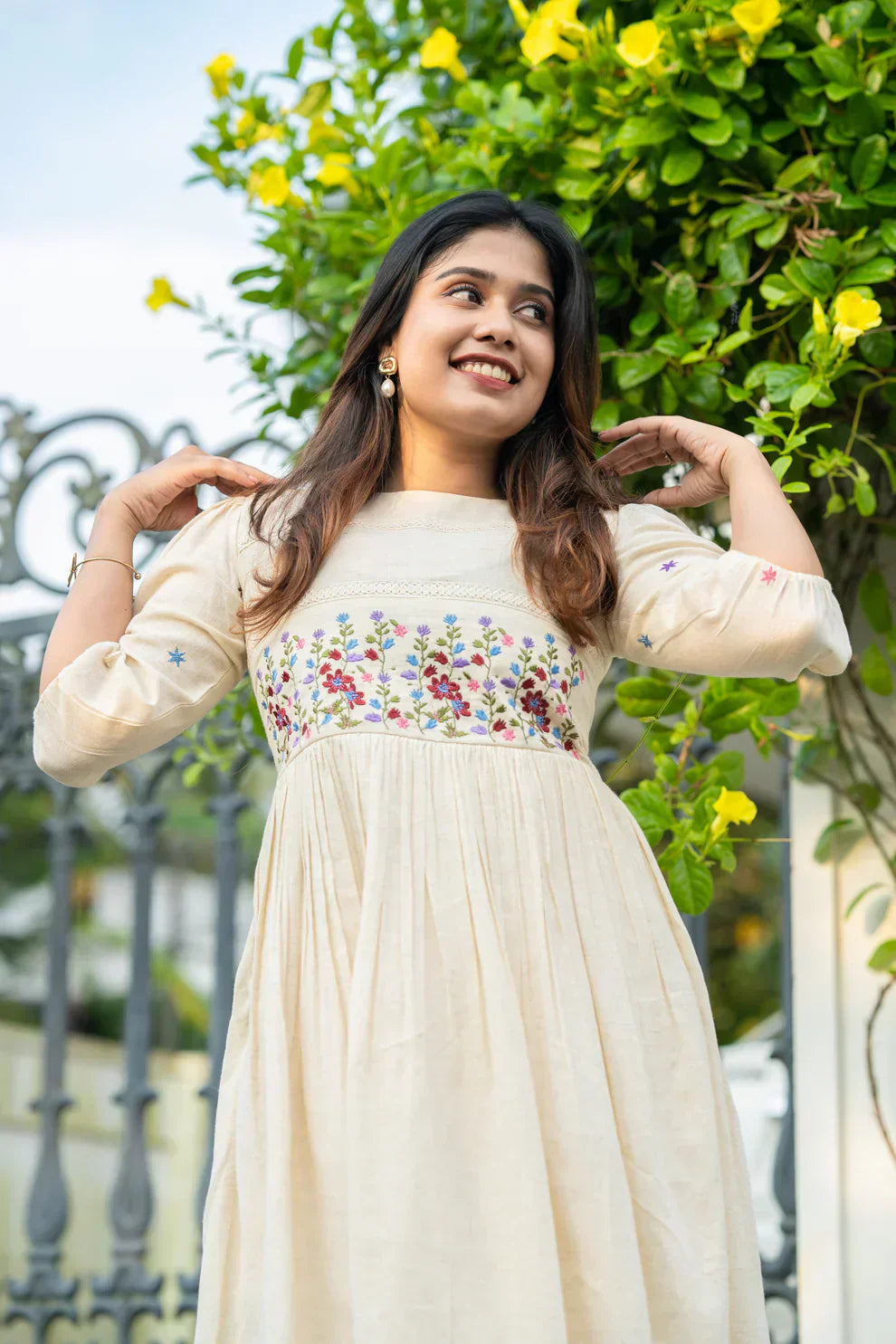 Off-white flex cotton dress with floral embroidery and crochet lace detailing on yoke and sleeves