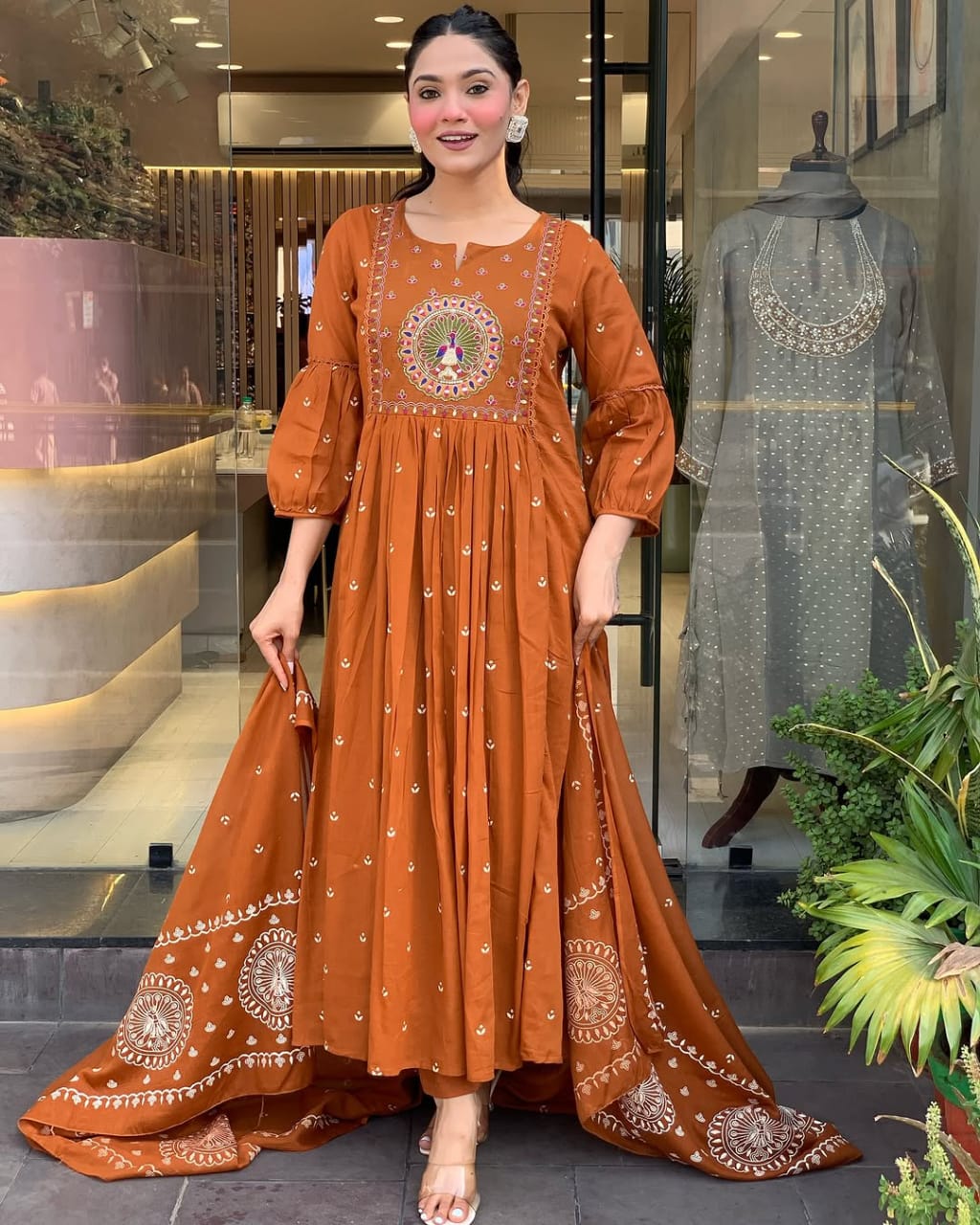 Elegant Rust Orange Anarkali Suit with Intricate Embroidery